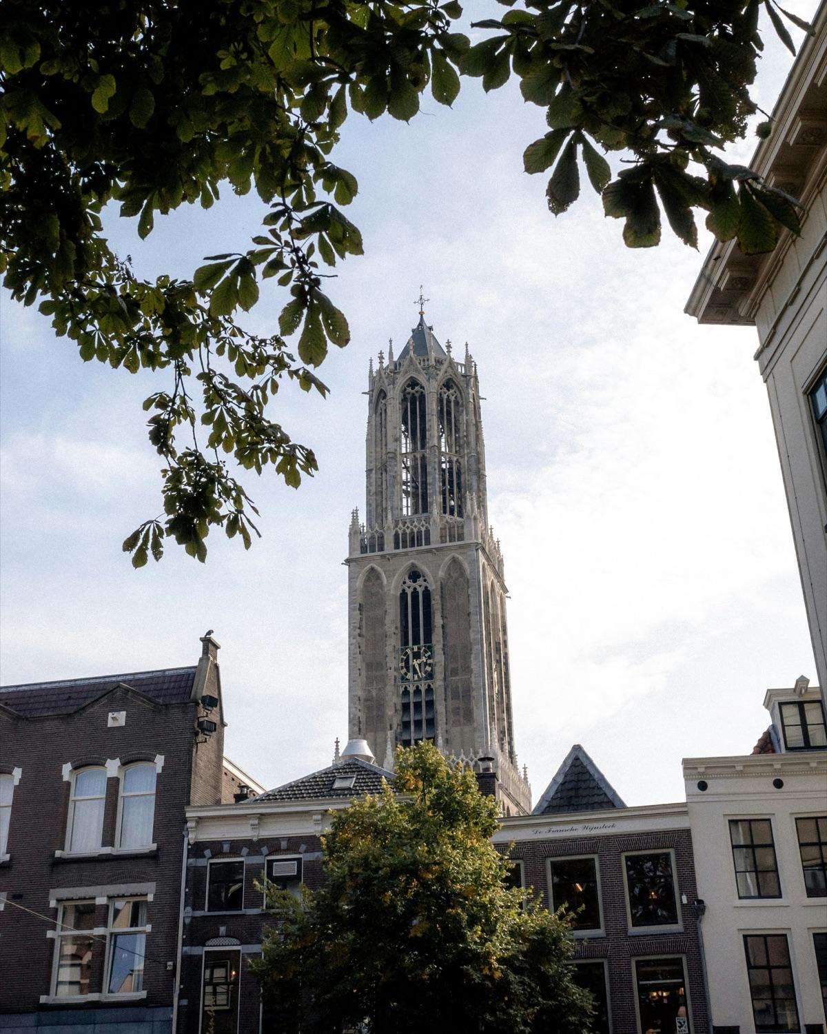 The Dom Tower rising above the canal houses of Utrecht
